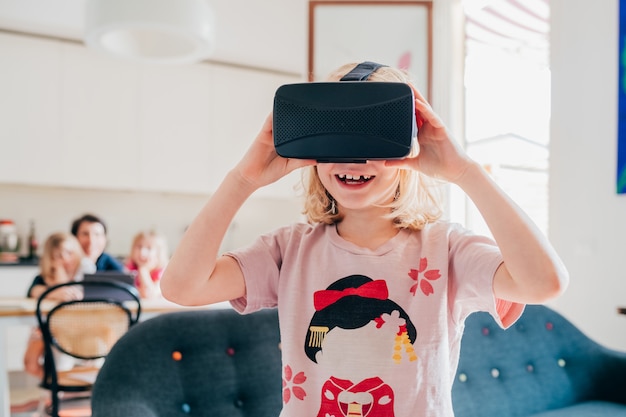 Female child indoor using 3d viewer