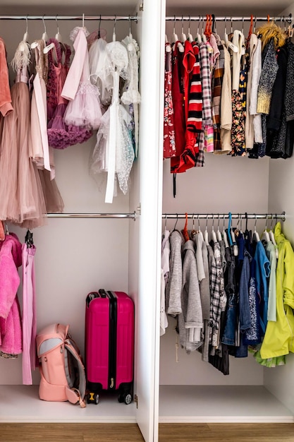 Female childish wardrobe apparel hanged comfortable vertical storage marie kondo minimalist method