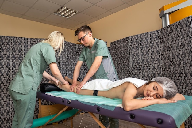 Female client enjoys a relaxing foot massage in a spa salon