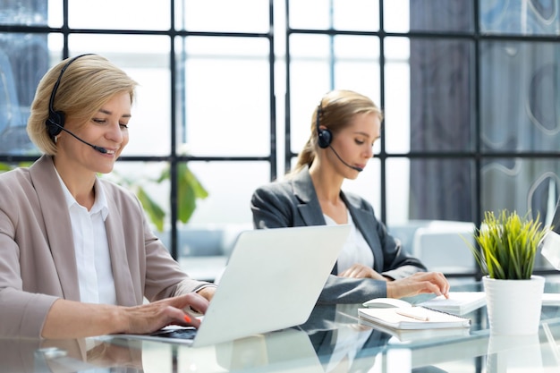 Female colleagues working in a call center