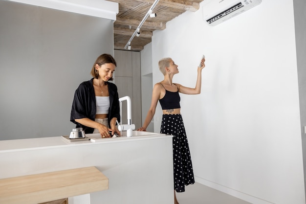 Female couple cook healthy at kitchen