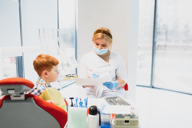 Female dentist and child in a dentist office