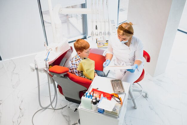 Female dentist and child in a dentist office