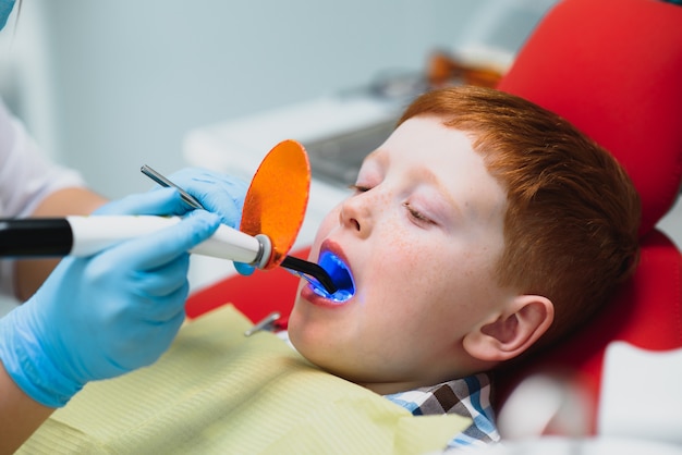 Female dentist and child in a dentist office