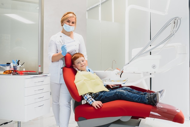 Female dentist and child in a dentist office