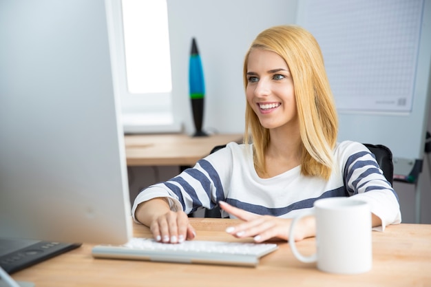 Female designer working on computer