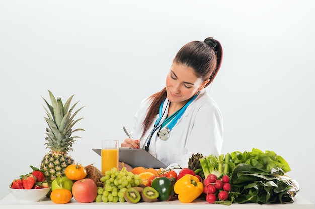 Female dietitian in uniform with stethoscope