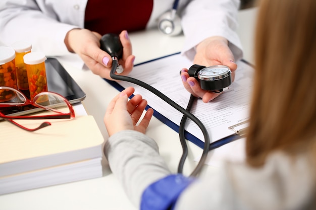 Female doctor arms make medic procedure closeup