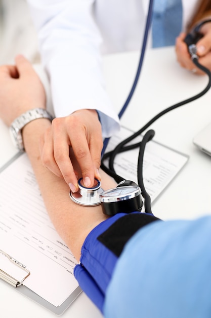 Female doctor arms make medic procedure closeup