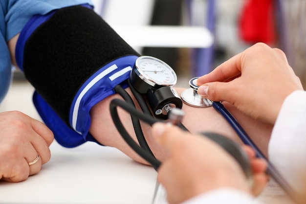 Female doctor arms make medic procedure closeup