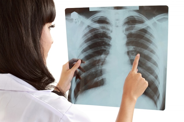 Female doctor carefully x-ray of patient