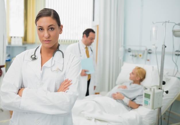 Female doctor folding her arms