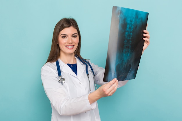 Female doctor in glasses with X-ray