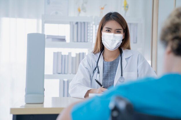 Female doctor at hospital with patient