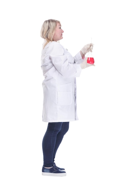 Female doctor in a lab coat with a laboratory flask