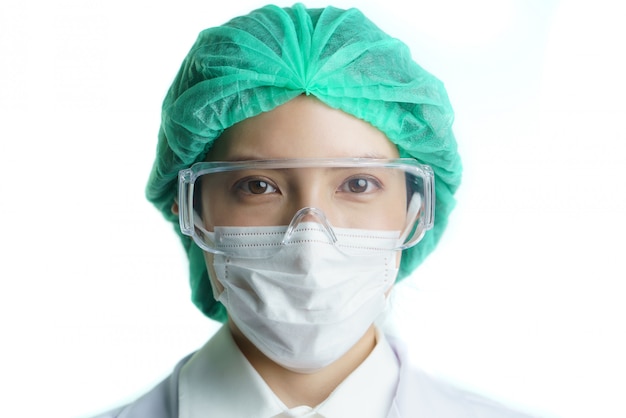 Photo female doctor in the protective equipment and masks looking at front