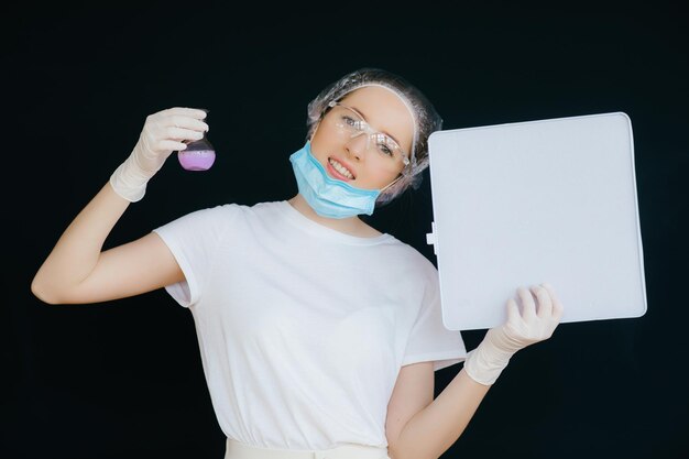 Female doctor in the protective suits and mask