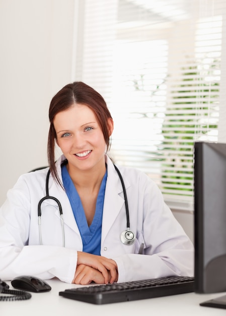 Female doctor smiling in office