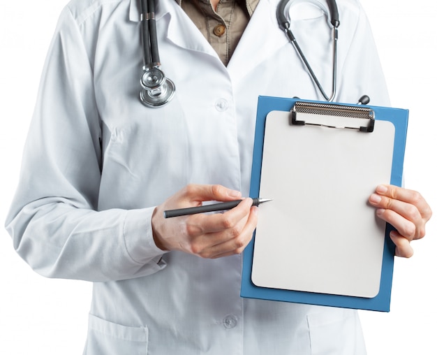 Female doctor in uniform holding clipboard