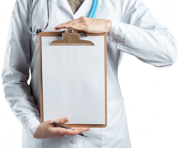 Female doctor in uniform holding clipboard