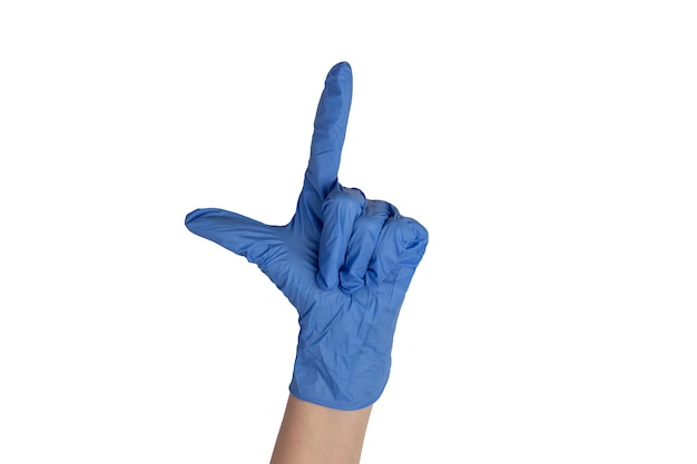 Female doctor wearing blue styryl gloves and showing different hand gestures isolated on white background Health concept Hospital medical care