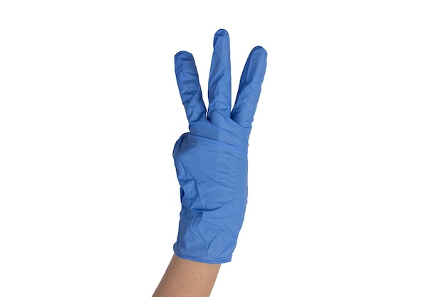 Female doctor wearing blue styryl gloves and showing different hand gestures isolated on white background Health concept Hospital medical care