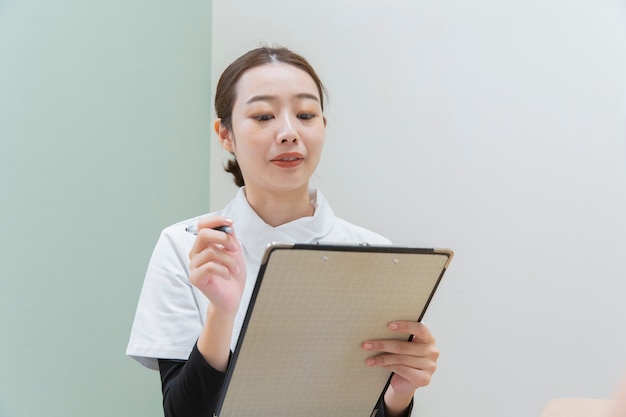 Female doctor with clipboard