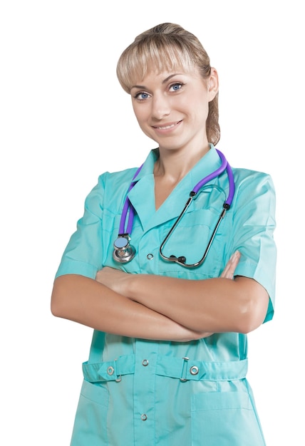 Female doctor with crossed arms smiling and looking at camera isolated