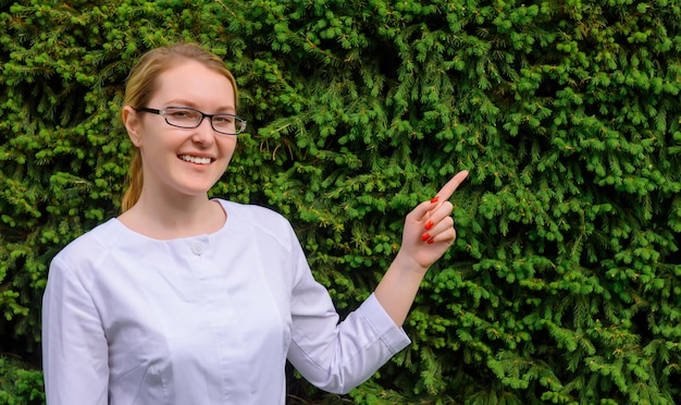 Female doctor with finger point up