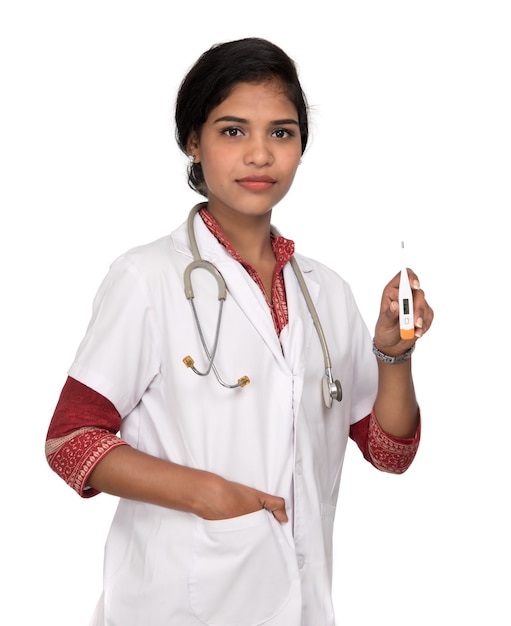 Female doctor with a thermometer on isolated background