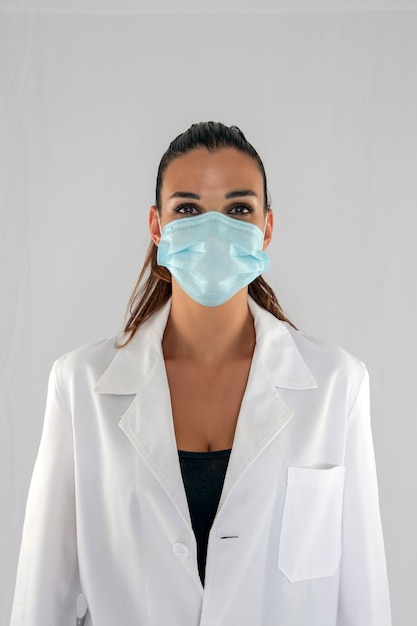 Female doctor with virus protection mask