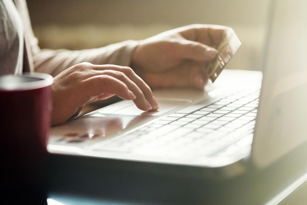 Female doing online shopping with credit card