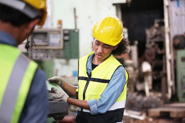 Female engineers working in industry factory