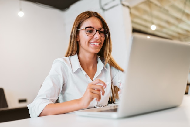 female entrepreneur using laptop.