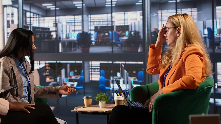 Photo female executive feeling sick and exhausted in a meeting to discuss strategies