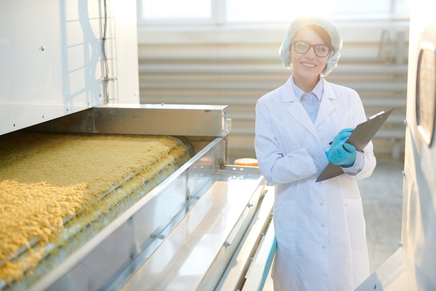 Female Factory Worker Posing in Sunlight