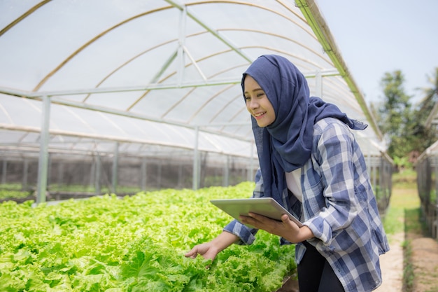 Female farmer with tablet