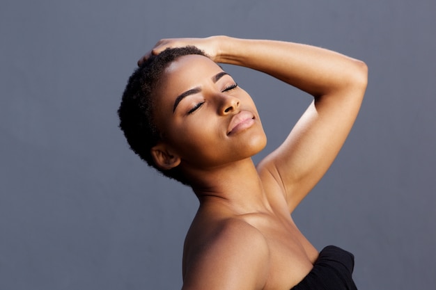 Female fashion model with hand in hair