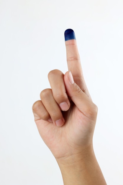 Photo female finger hand with blue ink