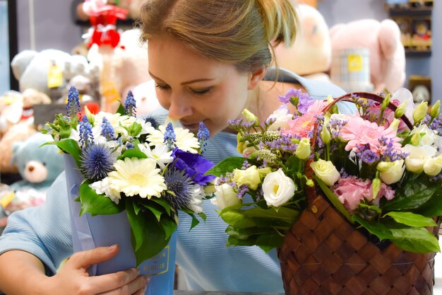 Female florist in flower shop.