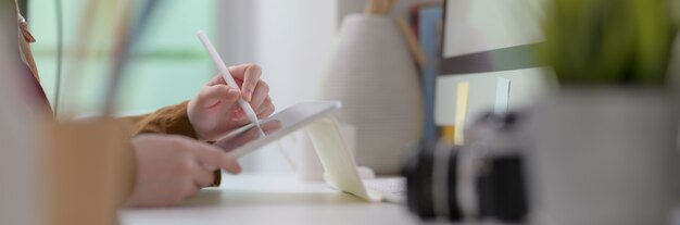 Female freelancer working on a graphic tablet