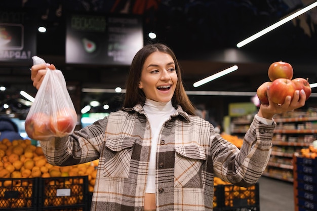 Female grocery shopper opposes the use of plastic bags