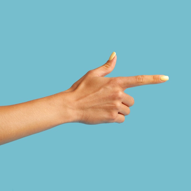 Female hand on a blue background in various positions