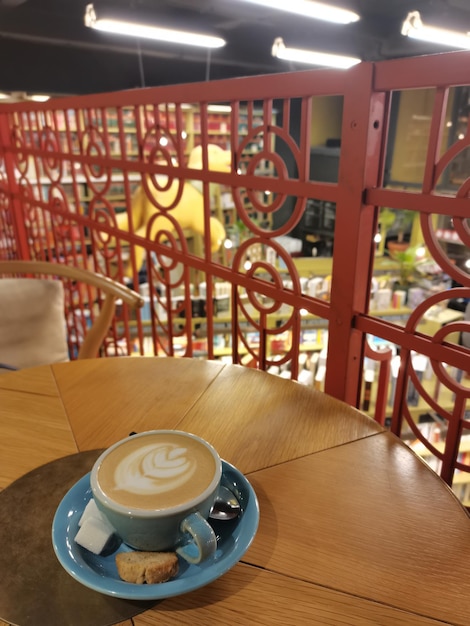 Female hand and cup of coffee in creative coffee shop st petersburg Russian coffee shops Russian architecture aesthetics of relaxation coffee and petersburg