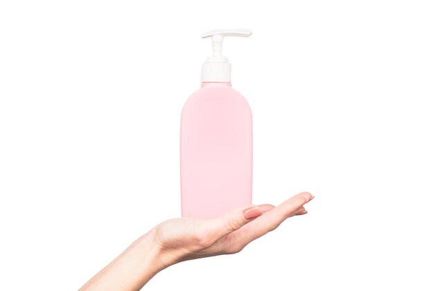 Female hand hold soap bottle with copy space