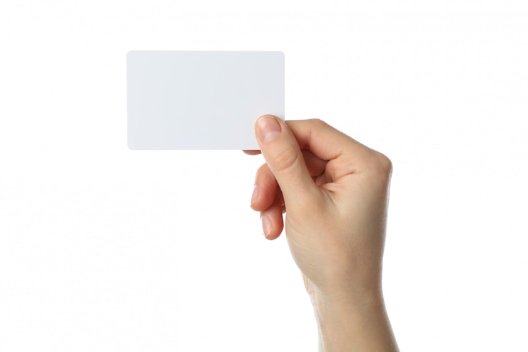 Photo female hand holding blank business card, isolated on white background