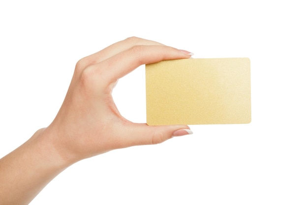 Mano femminile che tiene carta di credito in plastica vuota isolata su sfondo bianco, primo piano, ritaglio, vista laterale