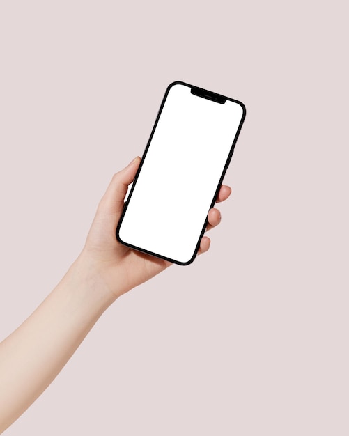 Photo female hand holding cell phone with blank screen on pink background mockup