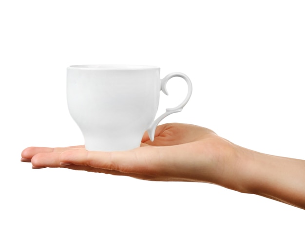 Female hand holding cup isolated on white