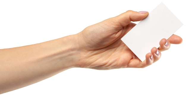 Female hand holding empty paper isolated on white background. Copy paste image or text.